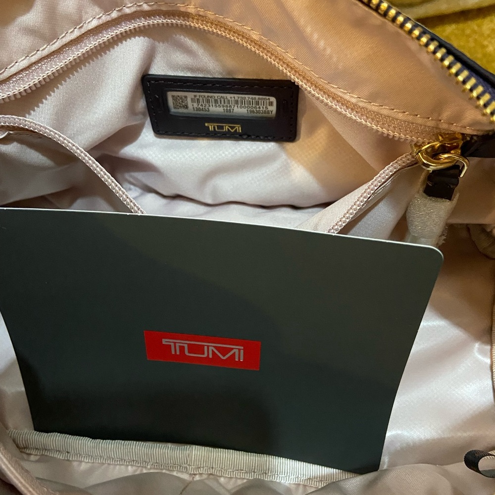 Tumi cosmetic and jewelry bag